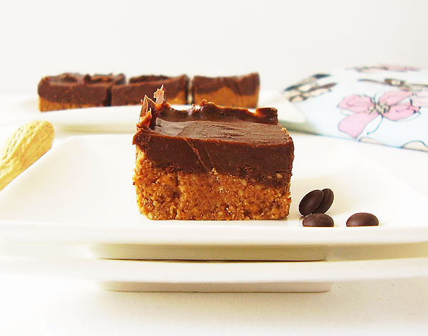 Peanut Butter Chocolate No Bake Bars are under 30 minutes easy peanut butter dessert with semi-sweet chocolate chips and cracker crumbs. We name it simple “Peanut Miss Hugandkiss”