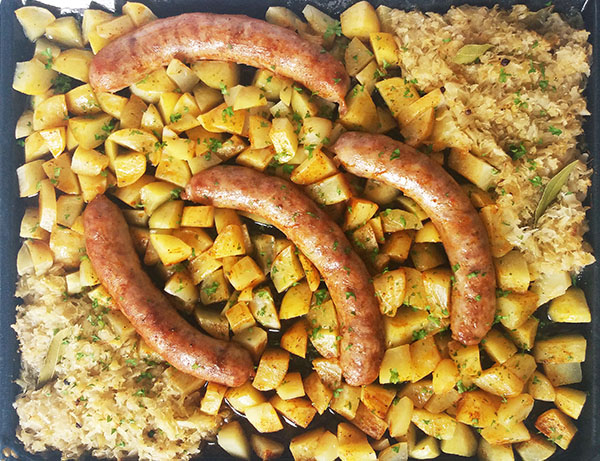 Sheet Pan Roasted Potatoes, Sausage and Sauerkraut: for all pan roasted potatoes, sausage sauerkraut and beer lovers ! Easy dinner, German sheet pan comfort food !