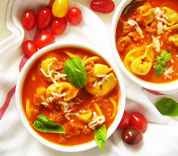 Tortellini Soup with Italian Sausage (Quick Version) is Italian seasoning sausage tortellini soup recipe ready to serve in 20 minutes. For the best results use cheese tortellini but any other stuffed favorite pasta works well! It is hearty Italian soup, full of flavours and so easy to make!