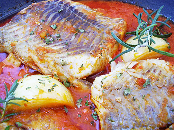 Pan Seared Cod in Tomato Sauce is delicious one pan cod fillets dish with tomato basil sauce. Shakshuka style cod is another name for easy fresh cod recipe so popular to enjoy on Good Friday! Ready in 30 minutes!