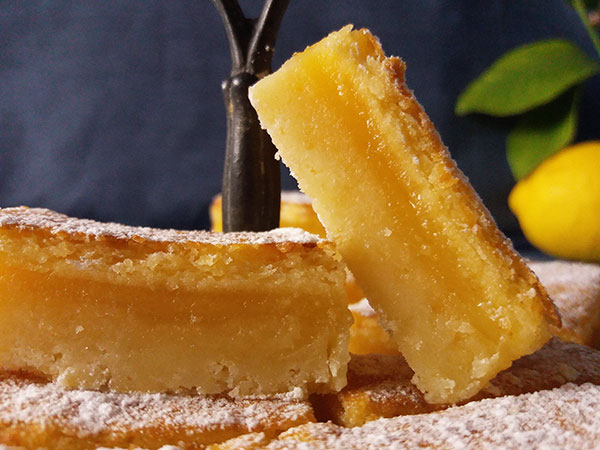 Tea Time Lemon Bars are easy lemon dessert with shortbread crust and lemon juice filling. So tangy and so sweet!