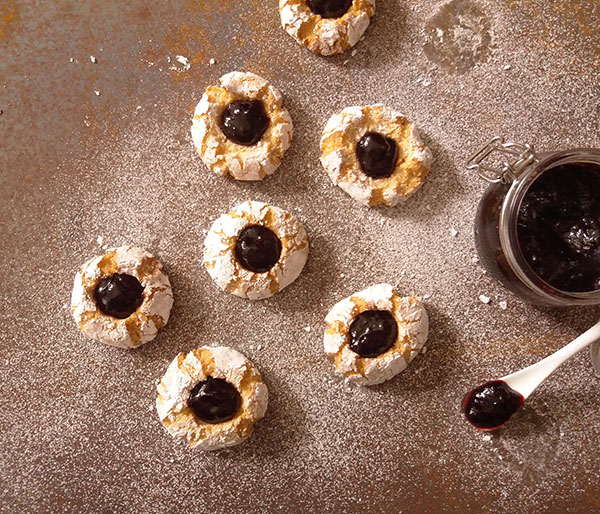 Amaretti Thumbprints are Italian almond pearls, so easy to make. Simple and perfect cookie recipe for holidays !