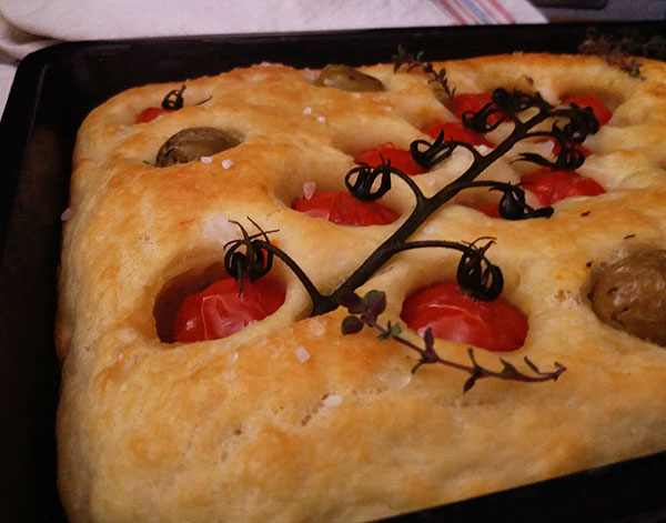 Simple Focaccia is easy Italian focaccia bread recipe using Manitoba flour, olive oil and warm water. Great to enjoy simple slice with wine or cut to make a sandwich but could be served with stew or soup!