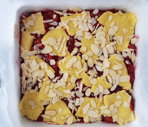 Sweet Cherry Cookie Squares from Scratch is cherry pie wrapped in cookie dough for great sweet cherries dessert recipe. Almond slices on the top are just great! Sweet Cherry Cookie Squares from Scratch is cherry pie wrapped in cookie dough for great sweet cherries dessert recipe. Almond slices on the top are just great!