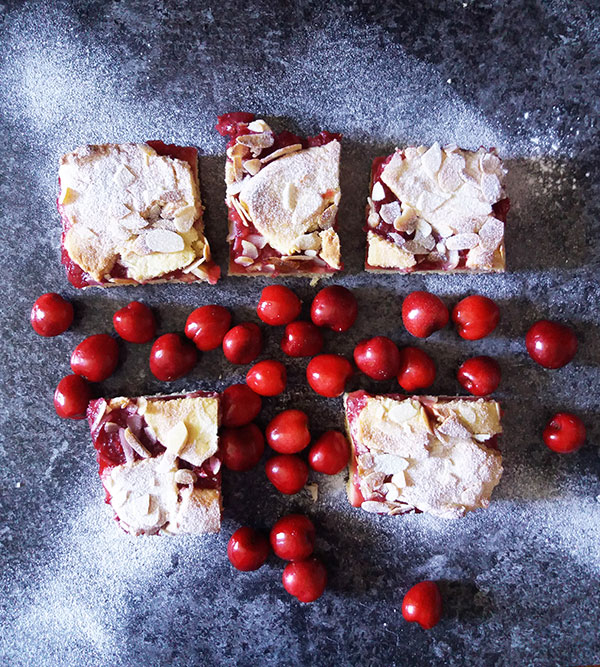 Sweet Cherry Cookie Squares from Scratch is cherry pie wrapped in cookie dough for great sweet cherries dessert recipe. Almond slices on the top are just great! Sweet Cherry Cookie Squares from Scratch is cherry pie wrapped in cookie dough for great sweet cherries dessert recipe. Almond slices on the top are just great!