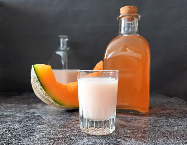 Meloncello from Scratch is an easy Tuscan cantaloupe digestive to enjoy during summer. It is the base to make meloncello liqueur or to garnish your favourite ice cream with.