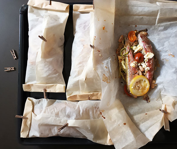 Fish ( Red Mullet ) En Papillote aka Triglia Rossa al Cartoccio is fish cooked in parchment paper in the oven for amazing summer main dishes.