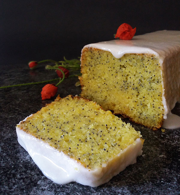 Poppy Seed Bread with Glaze is fantastic lemon poppy seed recipe with fresh lemon juice and powdered sugar glaze. Easily served as afternoon cake, it turns into dessert everybody loves!