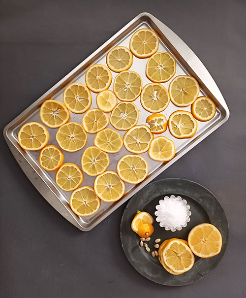 Preserved Lemons in Olive Oil made with 3 ingredients and herbs of your preference give the best of virgin olive oil, sea salt and beautiful lemons !