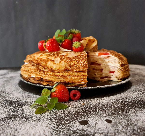 Le Courchevel Crepe Cake aka La Gâteau Courchevel is simple yet delicious French cake made with layers of crepes filled with light Mascarpone creme and your favourite berries. Le Courchevel Crepe Cake aka La Gâteau Courchevel is simple yet delicious French cake made with layers of crepes filled with light Mascarpone creme and your favourite berries.